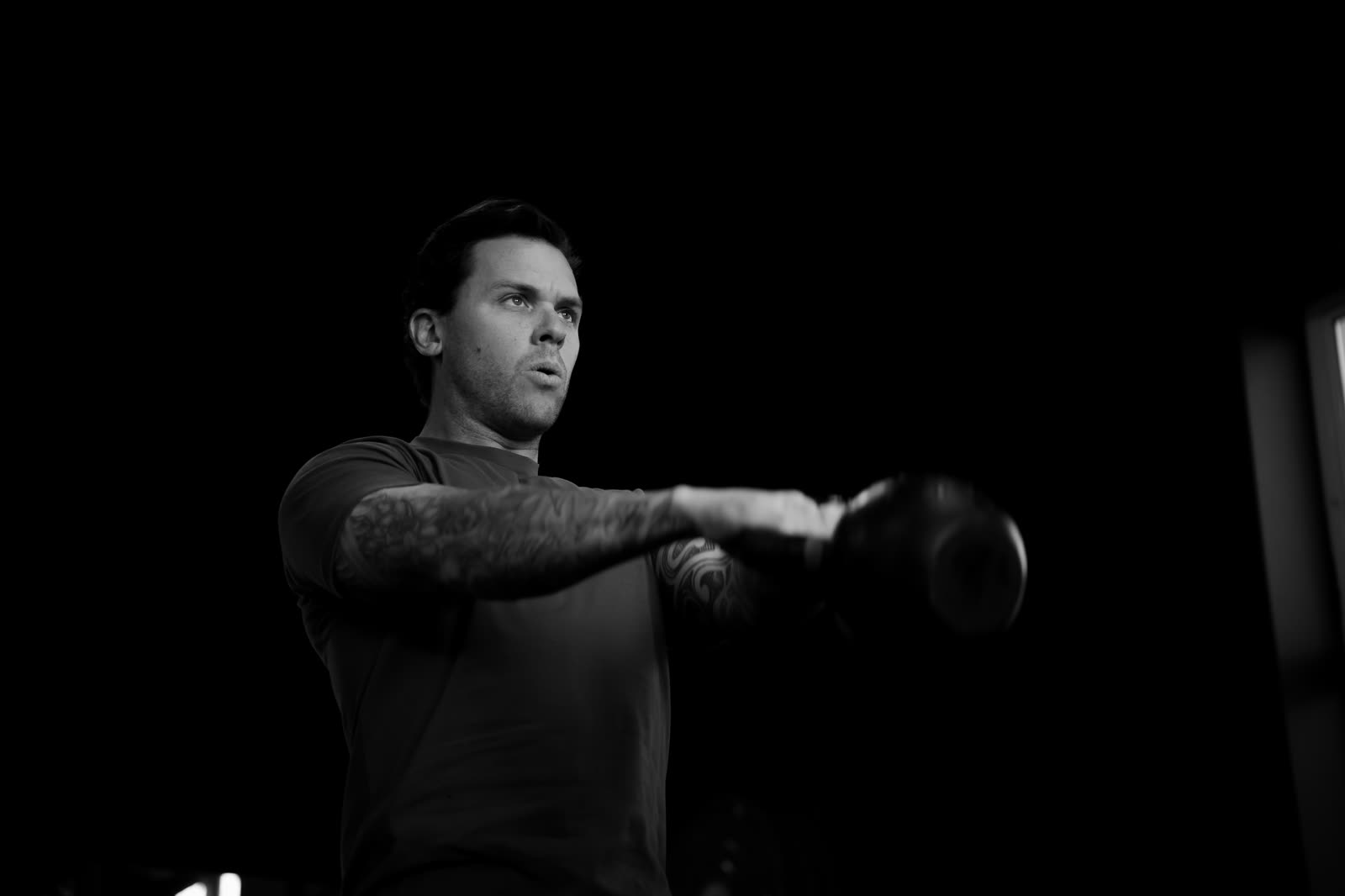 Athlete training with a kettlebell at Origin Fitness Studio